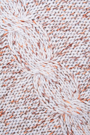 White, brown and orange knitted textured can use as background 