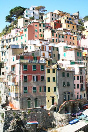 Italy. Cinque Terre. Colorful houses of Riomaggiore village の写真素材
