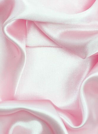 Smooth pink silk can use as backgroundの写真素材