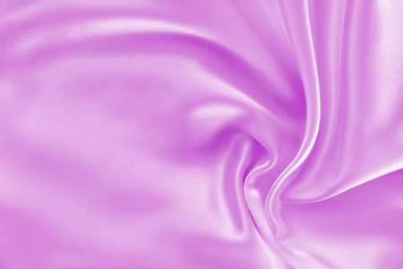Smooth elegant lilac silk or satin texture can use as backgroundの写真素材