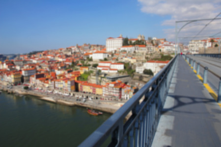 Portugal. Porto city. View of Douro river embankment in the morning. Dom Luis I bridge. In blur style   の写真素材