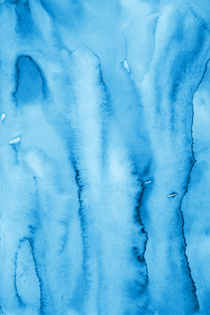 Abstract watercolor background with colorful layers on paper texture 
の写真素材