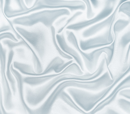 Smooth elegant grey silk or satin texture can use as backgroundの写真素材