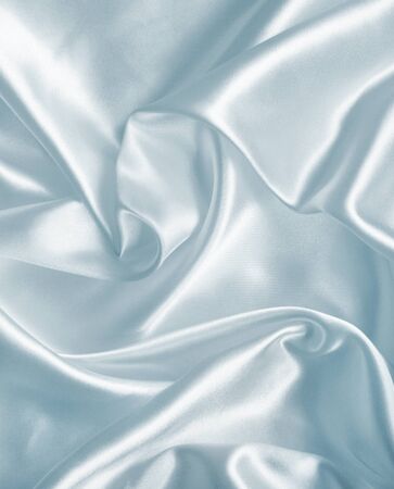 Smooth elegant grey silk or satin texture can use as backgroundの写真素材
