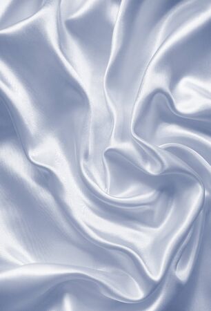 Smooth elegant grey silk or satin texture can use as backgroundの写真素材