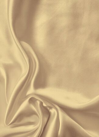 Smooth elegant golden silk can use as wedding background. In Sepia toned. Retro styleの写真素材