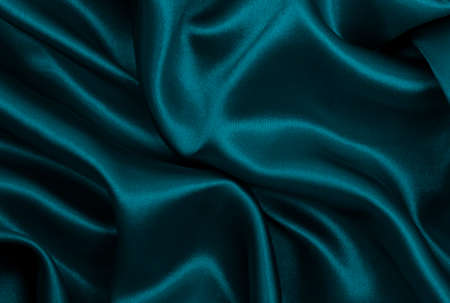 Smooth elegant blue silk or satin luxury cloth texture can use as abstract background. Luxurious background designの写真素材