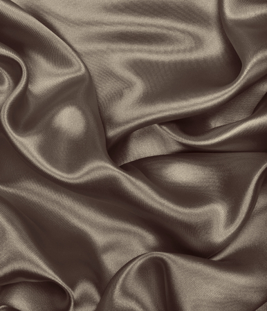 Smooth elegant golden silk can use as background. In Sepia toned. Retro styleの写真素材