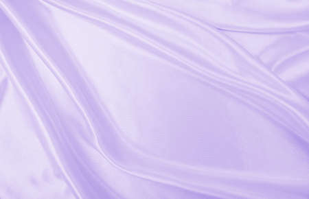 Smooth elegant lilac silk or satin texture can use as wedding background. Luxurious valentine day background designの写真素材