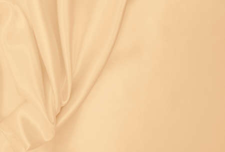 Smooth elegant golden silk or satin luxury cloth texture can use as wedding background. Luxurious background design. In Sepia toned. Retro styleの写真素材