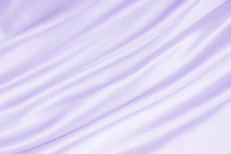 Smooth elegant lilac silk or satin texture can use as wedding background. Luxurious valentine day background designの写真素材