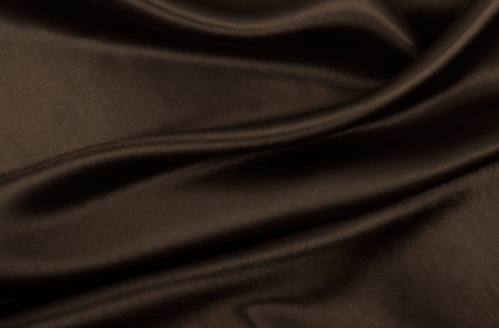 Smooth elegant brown silk or satin texture can use as abstract background. Luxurious background design. In Sepia toned. Retro styleの写真素材