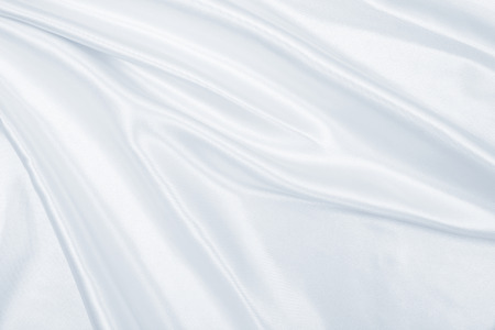 Smooth elegant grey silk or satin luxury cloth can use as wedding background. Luxurious Christmas background or New Year background design  の写真素材