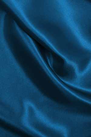 Smooth elegant blue silk or satin luxury cloth texture can use as abstract background. Luxurious background design  の写真素材