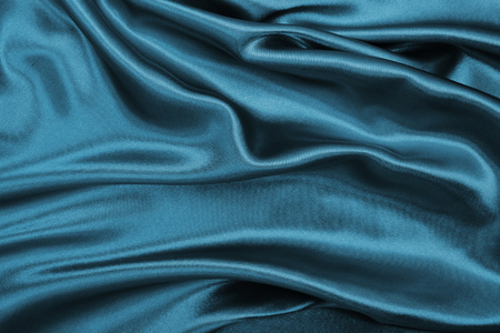 Smooth elegant blue silk or satin luxury cloth texture can use as abstract background. Luxurious background designの写真素材