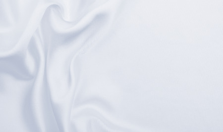 Smooth elegant grey silk or satin luxury cloth can use as wedding background. Luxurious background designの写真素材