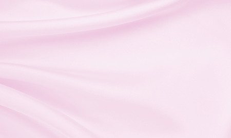 Smooth elegant pink silk or satin texture can use as wedding background. Luxurious background designの写真素材