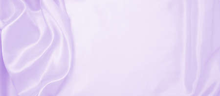 Smooth elegant lilac silk or satin texture can use as wedding background. Luxurious background designの写真素材