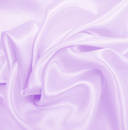 Smooth elegant lilac silk or satin texture can use as wedding background. Luxurious background designの写真素材