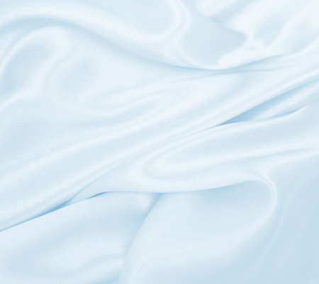 Smooth elegant blue silk or satin luxury cloth texture can use as abstract background. Luxurious background designの写真素材