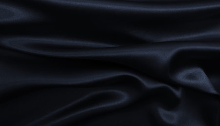Smooth elegant black silk or satin texture can be used as abstract background. Luxurious background designの写真素材