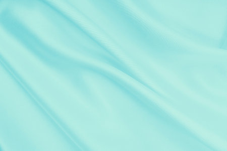 Smooth elegant blue silk or satin luxury cloth texture can use as abstract background. Luxurious background designの写真素材
