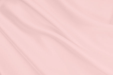Smooth elegant pink silk or satin texture can use as wedding background. Luxurious valentine day background designの写真素材