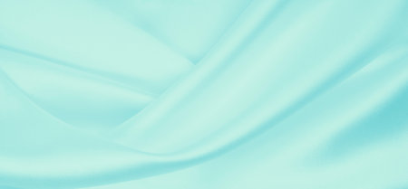 Smooth elegant blue silk or satin luxury cloth texture can use as abstract background. Luxurious background designの写真素材