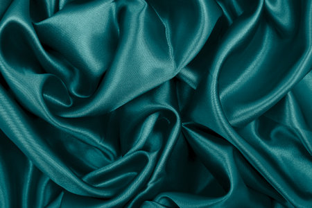Smooth elegant blue silk or satin luxury cloth texture can use as abstract background. Luxurious background designの写真素材
