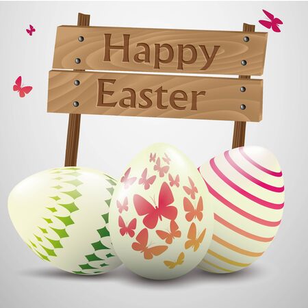 Easter eggs with a happy Easter on a wooden board.のイラスト素材