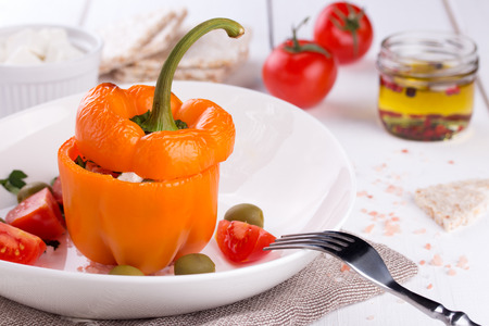 Plate with baked stuffed peppers.の写真素材