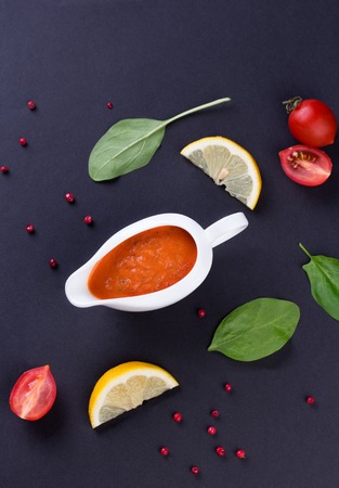 fresh tomato sauce in the white sauce boatの写真素材