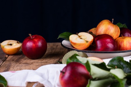 Ripe red apples on table close up. Selective focus.の写真素材
