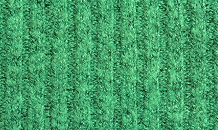 Green knitted fabricの写真素材