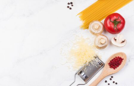 Minimalist style flat lay pasta recipe ingredient on white background. Kitchen wallpaper poster design.の写真素材