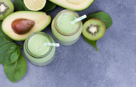 Blended green smoothie with ingredients. Selective focus.の写真素材