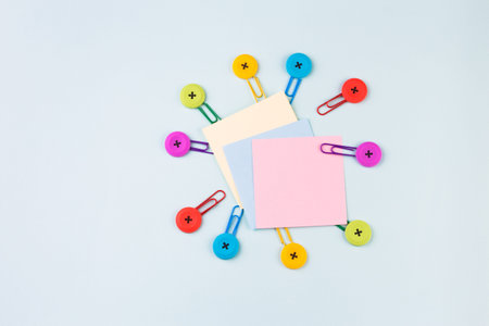 Reminder sticky note on wooden background, empty space for text. Office life concept. Back to...