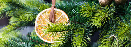 Closeup on Christmas tree decoration over festive backgroundの写真素材