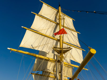 Detail of the masts of a tall ship against the blue skyの写真素材