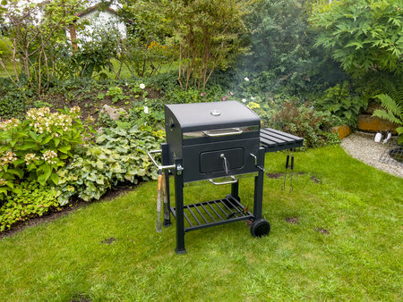 The grill system grills the meat when closed.の写真素材