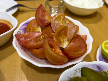 The salted tomatoes as a starter.の写真素材