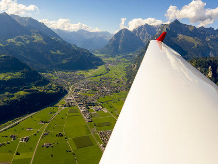 The flight over the valleys of Switzerland.の写真素材