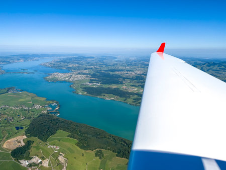 Flight over the rivers and mountains in Switzerland.の写真素材