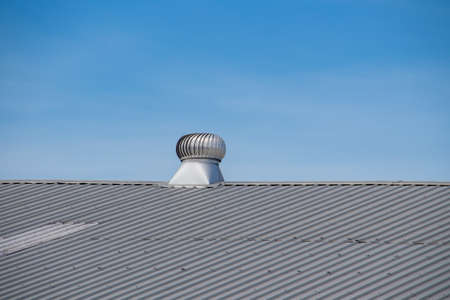 Turbine ventilator on the roof of the warehouseの写真素材