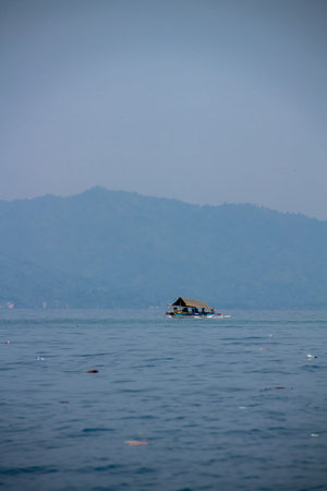 A fishing boat in the middle of the sea