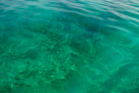 Blue sea water puddle abstract shape backgroundの写真素材