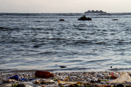 Sea water background with small waves on the beachの写真素材