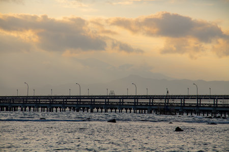 Beautiful sunset cloud scenery background from the beachの写真素材