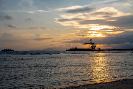 Beautiful sunset cloud scenery background from the beachの写真素材