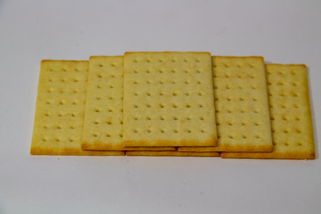 Arrangement of square biscuits on a white backgroundの写真素材